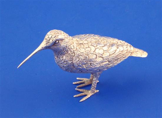 A modern silver free standing model of a snipe, 2.5 oz.